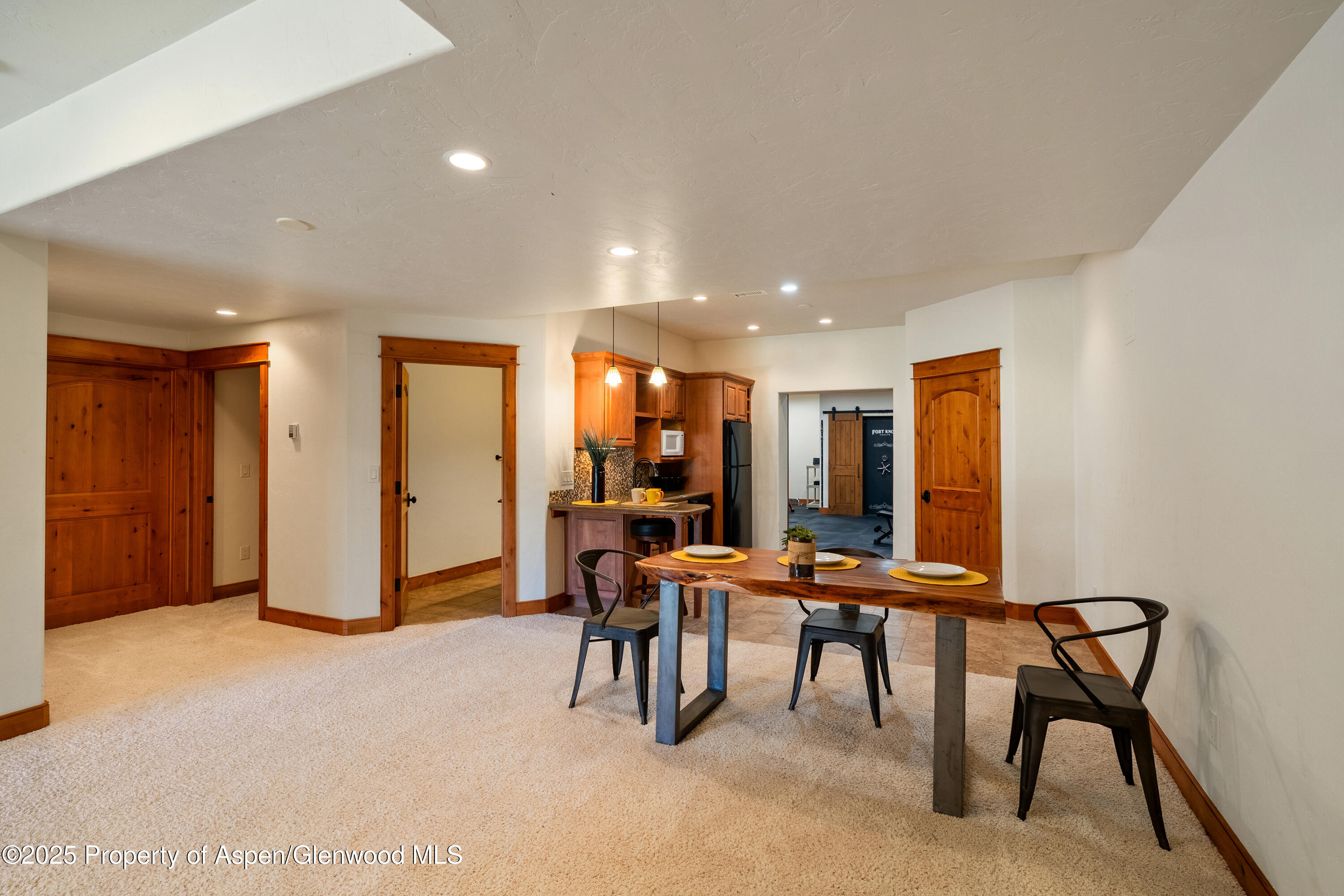 621 Elk Run Road New Castle, CO 81647 - Photo 39 of 61 Lower level eating area