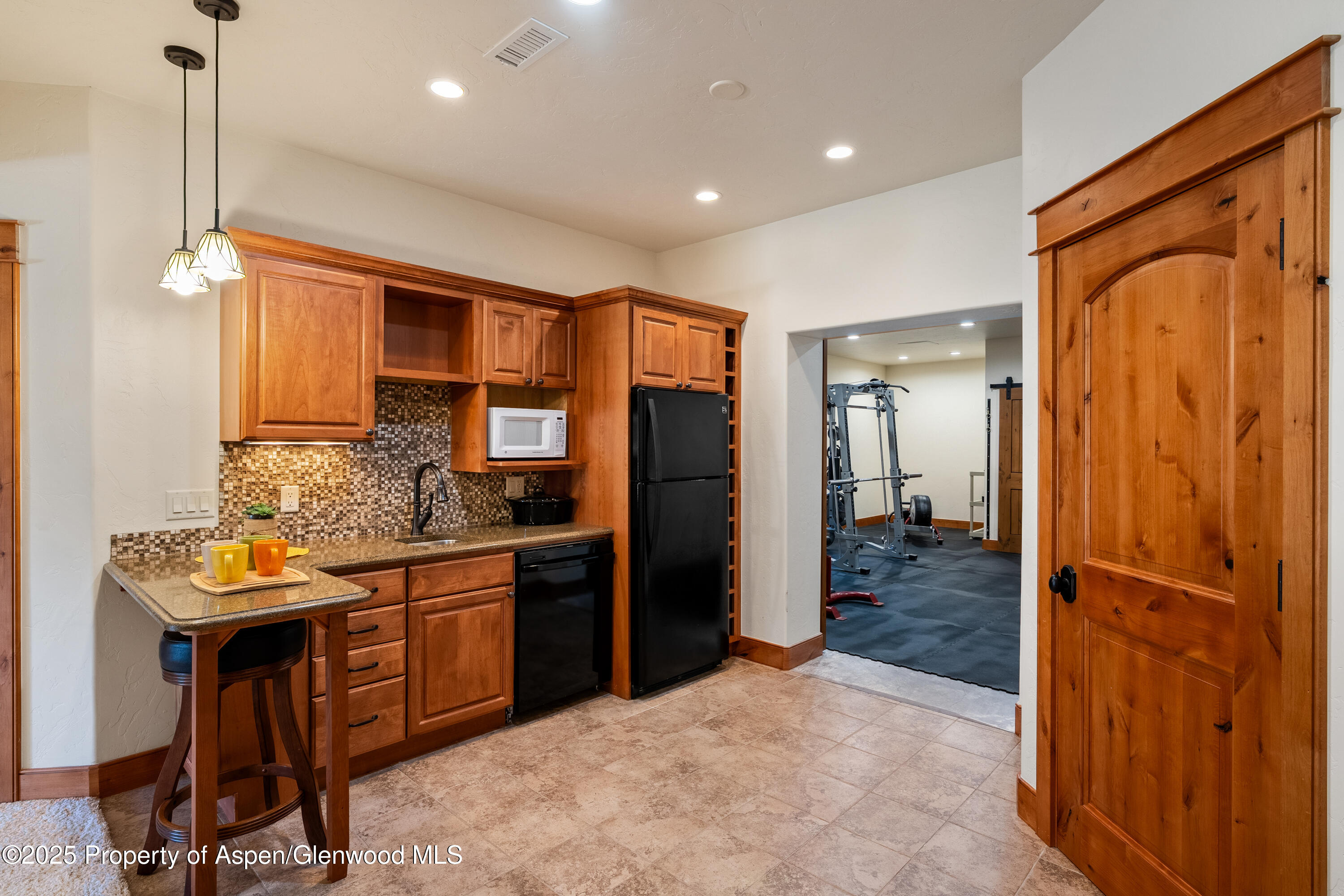 621 Elk Run Road New Castle, CO 81647 - Photo 40 of 61 Lower level kitchenette