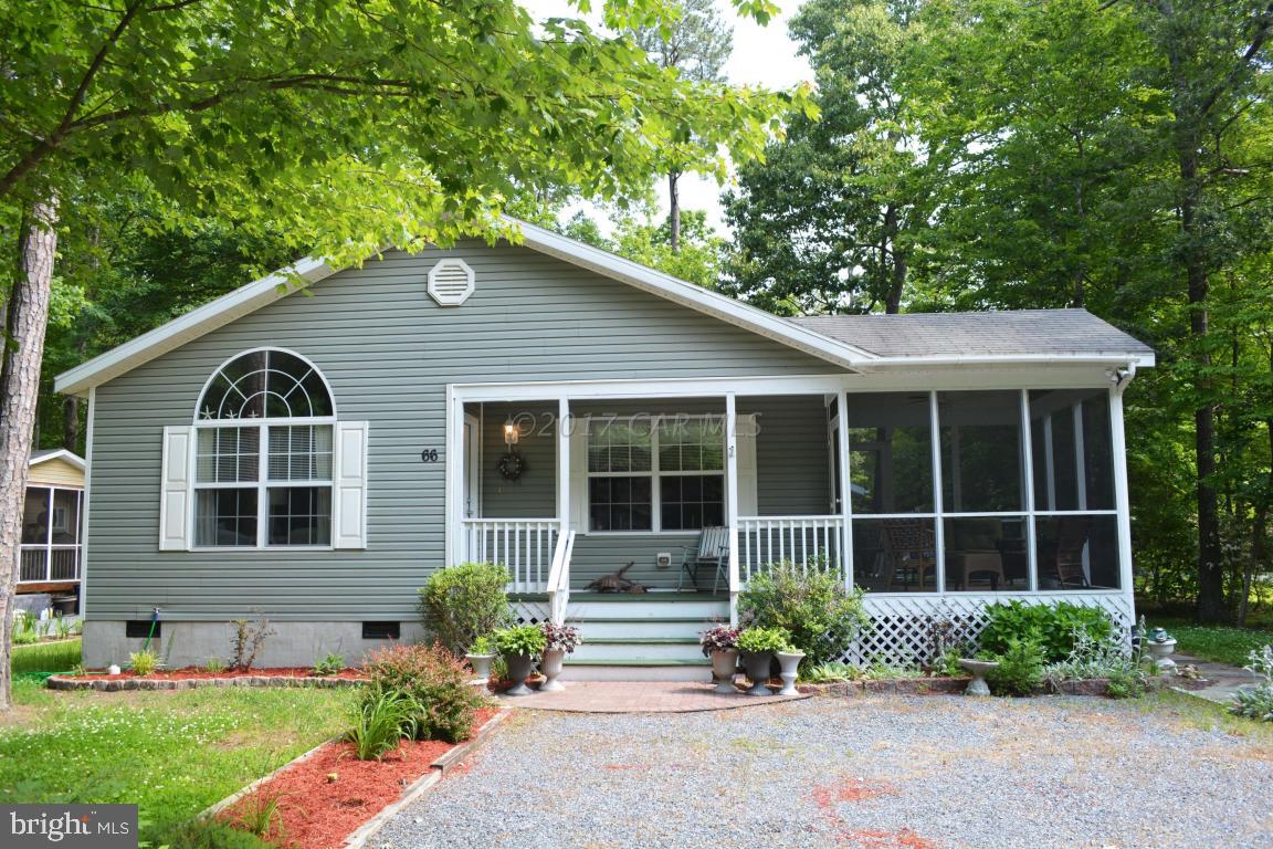 66 Sandyhook Road Ocean Pines, MD 21811 - Photo 1 of 18 a view of front of house with a yard