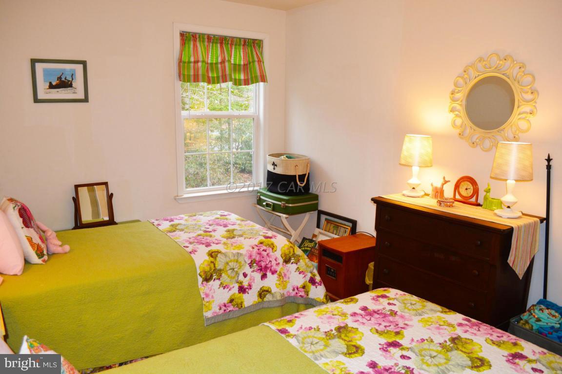 66 Sandyhook Road Ocean Pines, MD 21811 - Photo 13 of 18 a bedroom with bed and a window