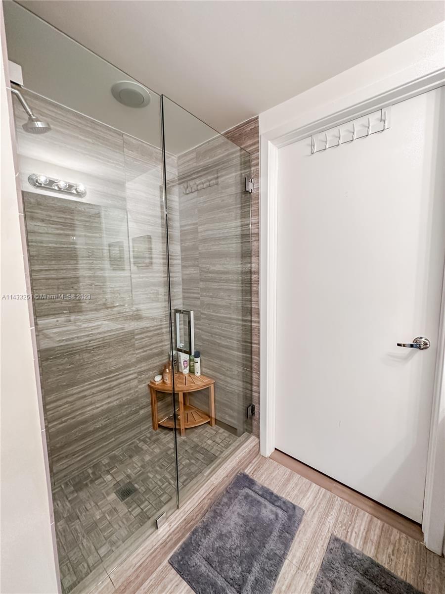 1010 Brickell Avenue, Unit 2505 Miami, FL 33131 - Photo 20 of 38 a bathroom with a shower