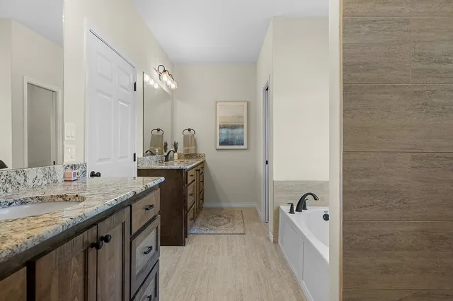 a bathroom with a sink and a bathtub