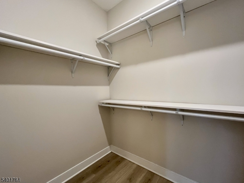 104 Myrtle Road Warren, NJ 07059 - Photo 16 of 26 a view of a room with racks on the wall