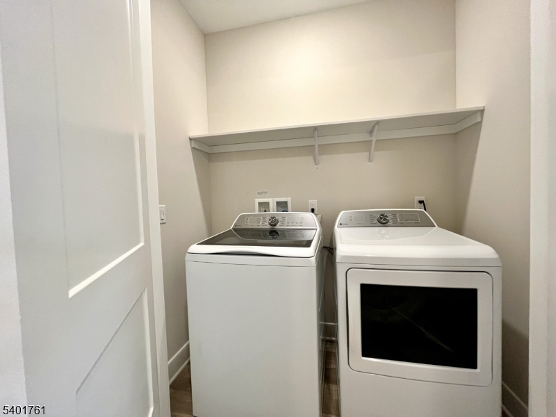 104 Myrtle Road Warren, NJ 07059 - Photo 20 of 26 a utility room with dryer and washer