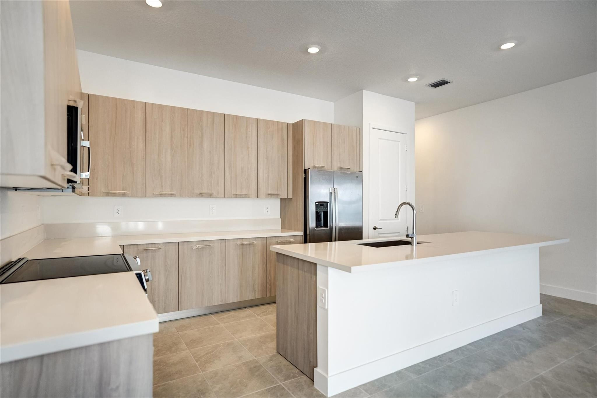 12328 Southwest 43rd Street Davie, FL 33330 - Photo 95 of 95 Large open floorplan modern kitchen