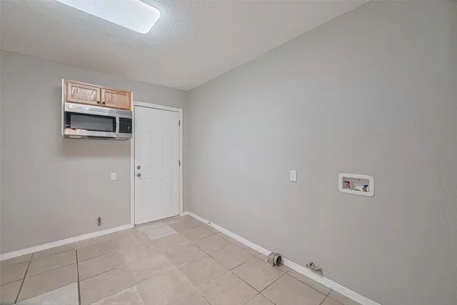 a view of a room with an empty space