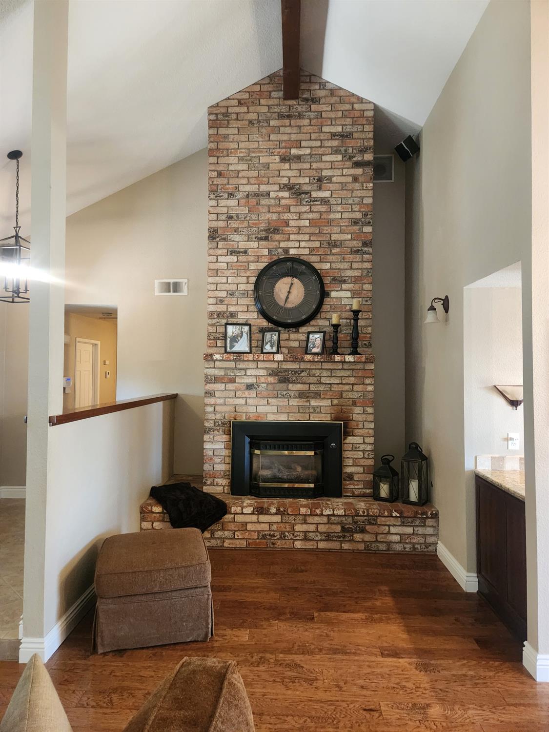 777 Jordanolo Drive Ripon, CA 95366 - Photo 11 of 61 a living room with furniture and a fireplace