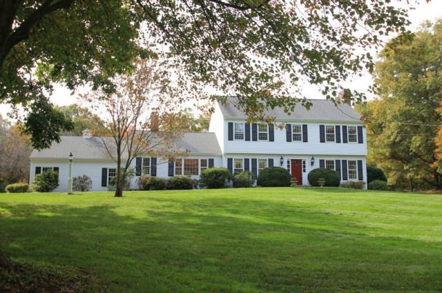 61 Hemlock Hills Road North Fairfield, CT 06824 - Photo 1 of 1 a front view of house with yard and green space