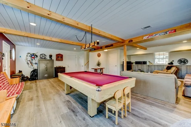 a dinning table and chairs in a room