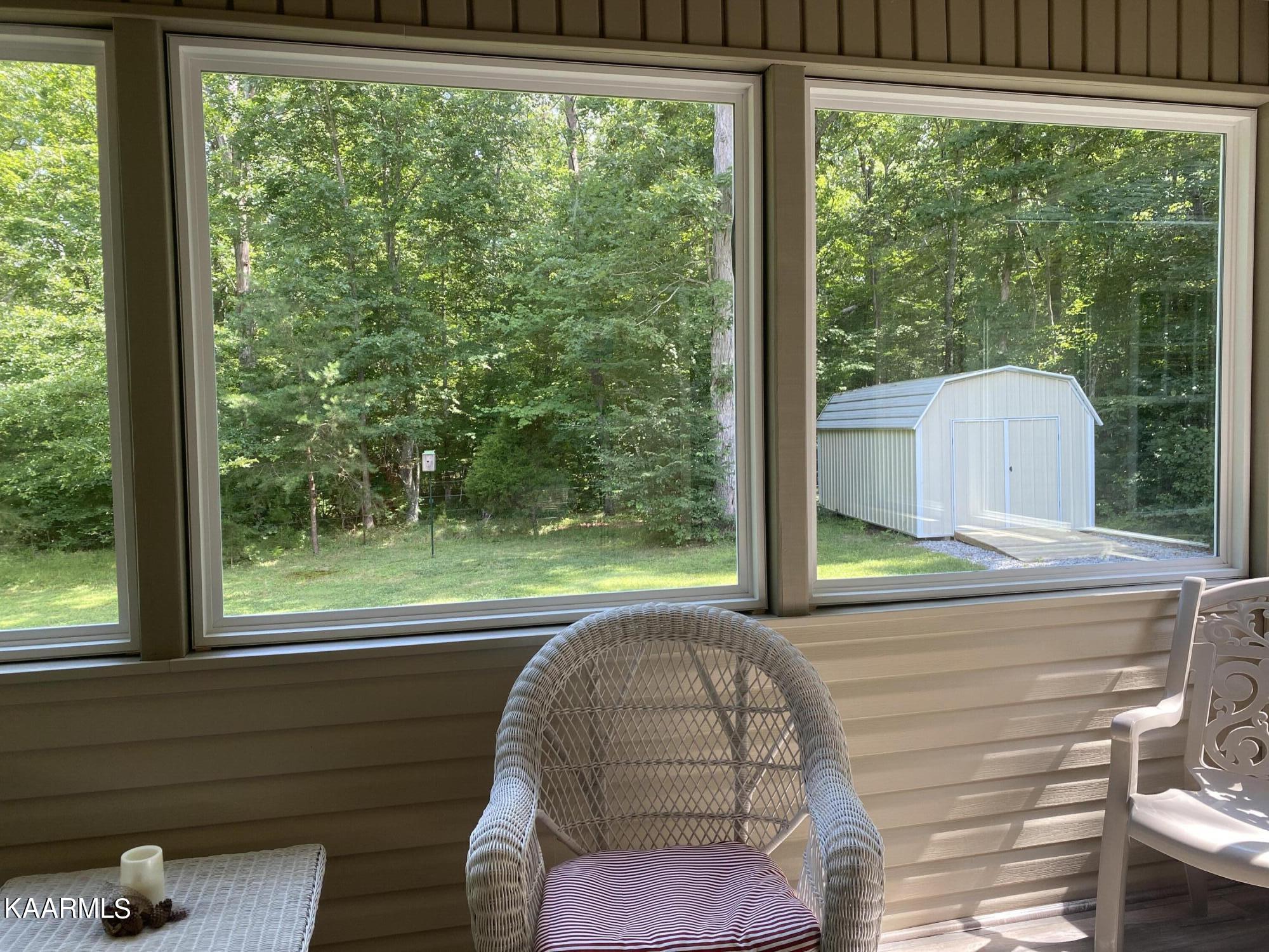 1021 Flathead Road Crossville, TN 38572 - Photo 32 of 43 Enclosed Sun Room