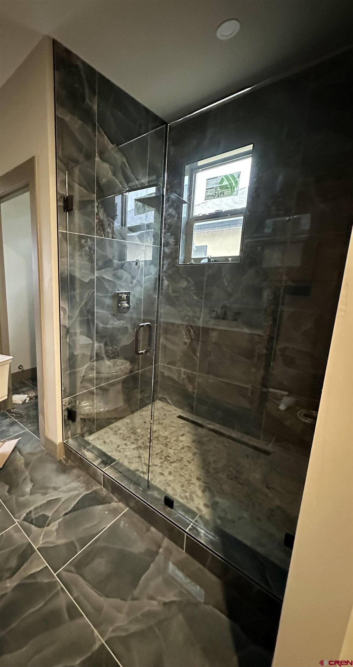 1526 Criterion Street Delta, CO 81416 - Photo 11 of 14 a bathroom with a shower