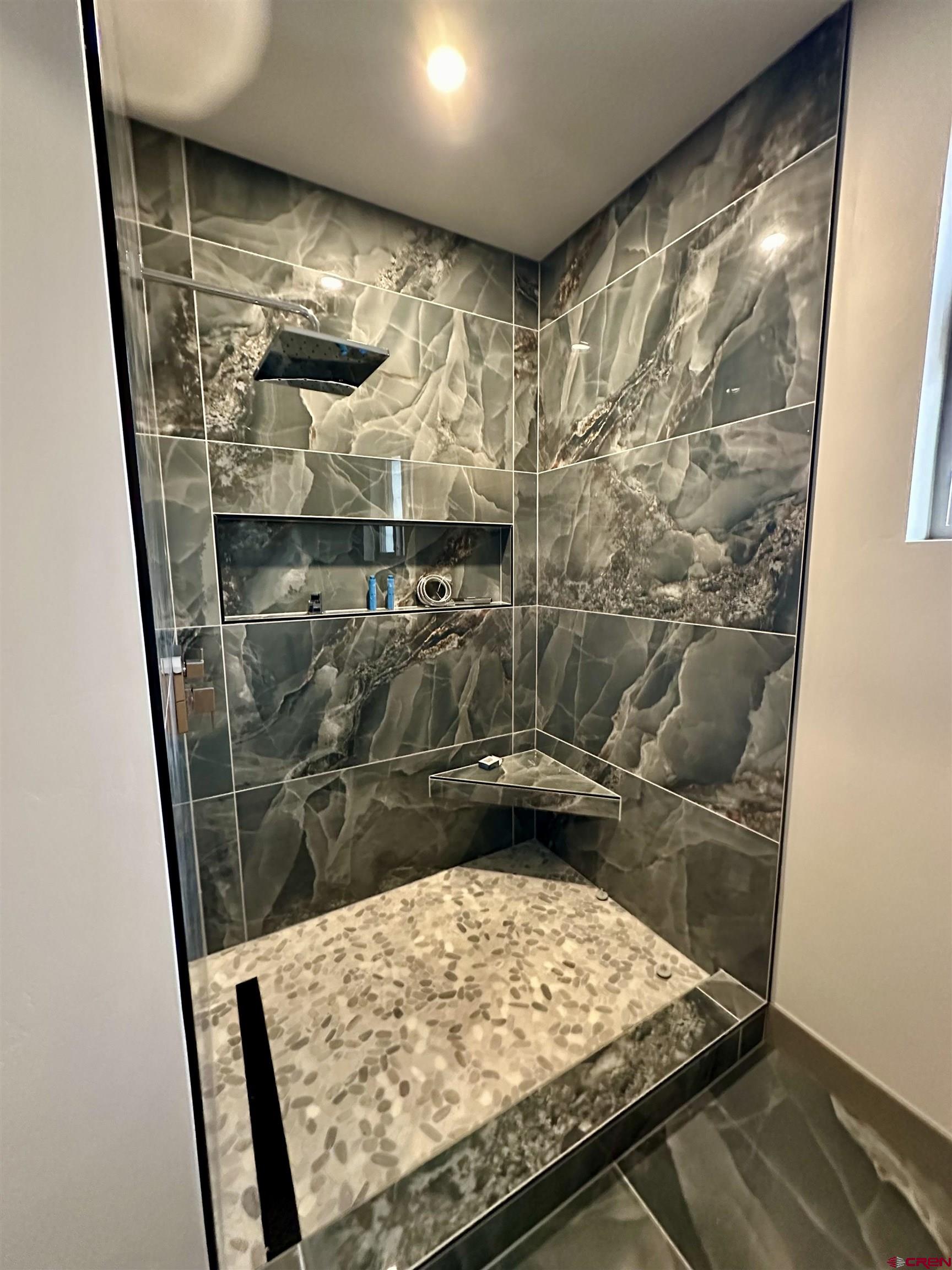 1526 Criterion Street Delta, CO 81416 - Photo 12 of 14 a room with water heater and wooden floor