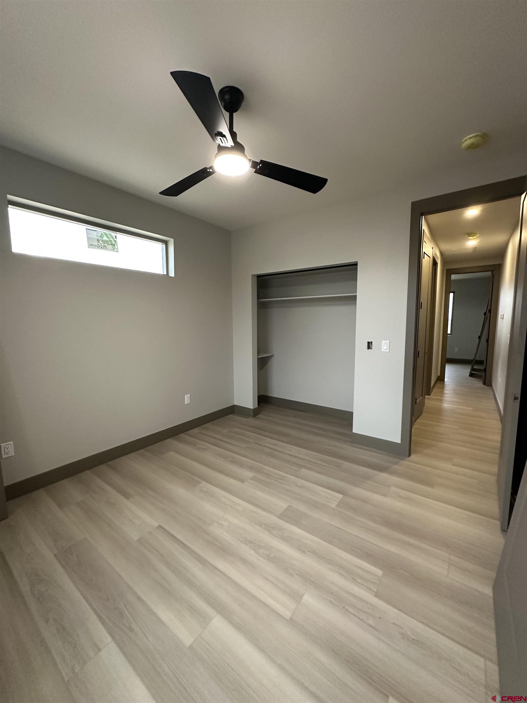 1526 Criterion Street Delta, CO 81416 - Photo 13 of 14 a view of empty room with wooden floor