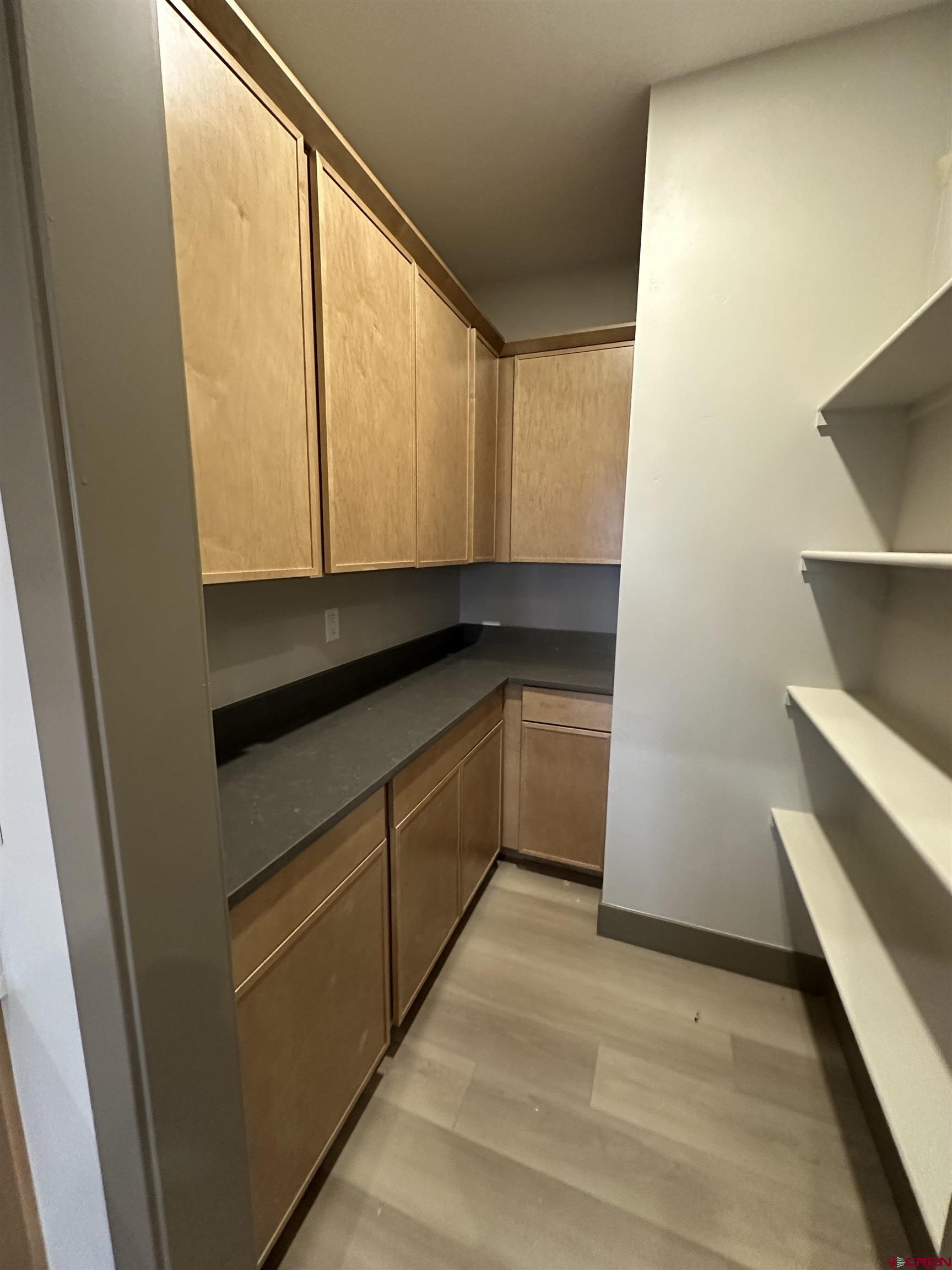 1526 Criterion Street Delta, CO 81416 - Photo 6 of 14 a kitchen with a sink and a stove top oven