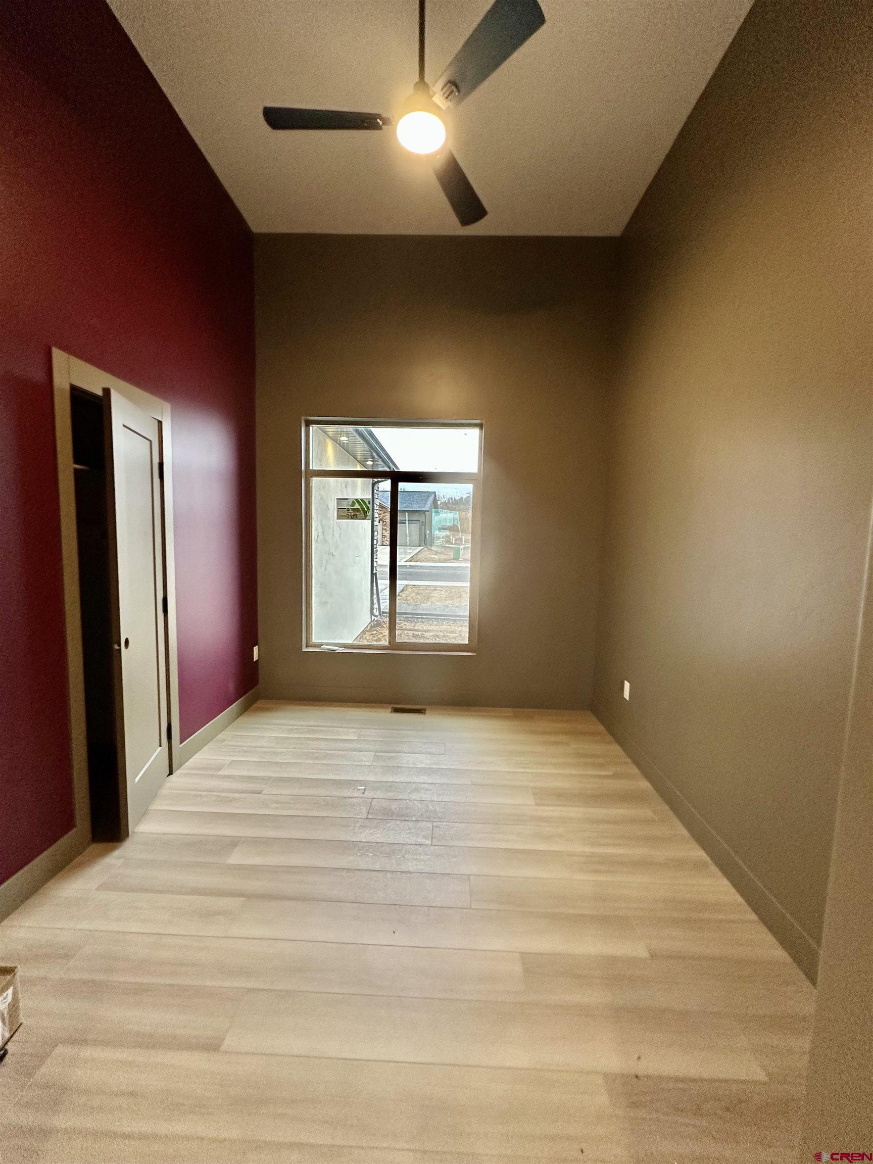 1526 Criterion Street Delta, CO 81416 - Photo 7 of 14 a big room with wooden floor and windows