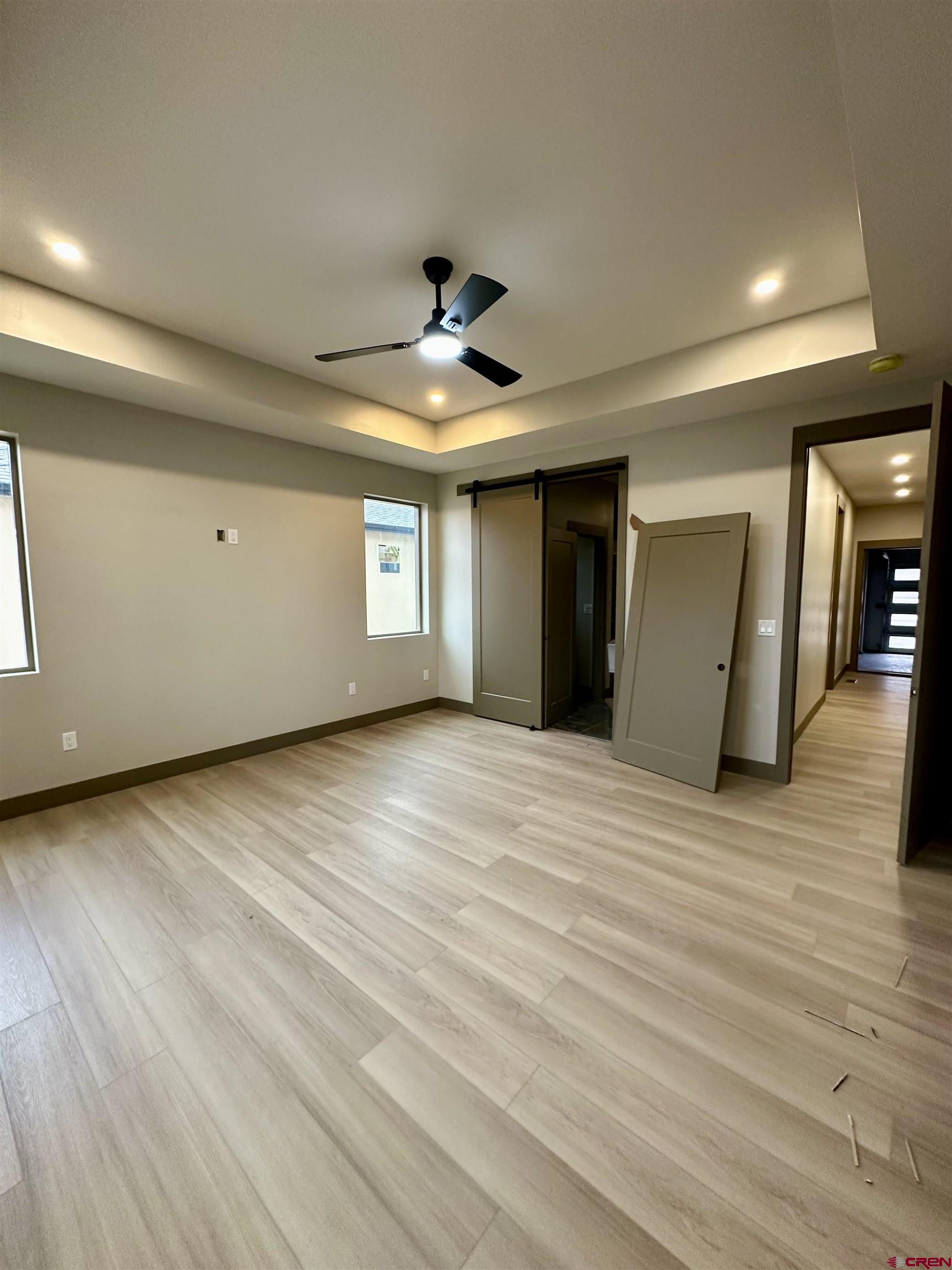 1526 Criterion Street Delta, CO 81416 - Photo 10 of 14 a view of an empty room with window and wooden floor