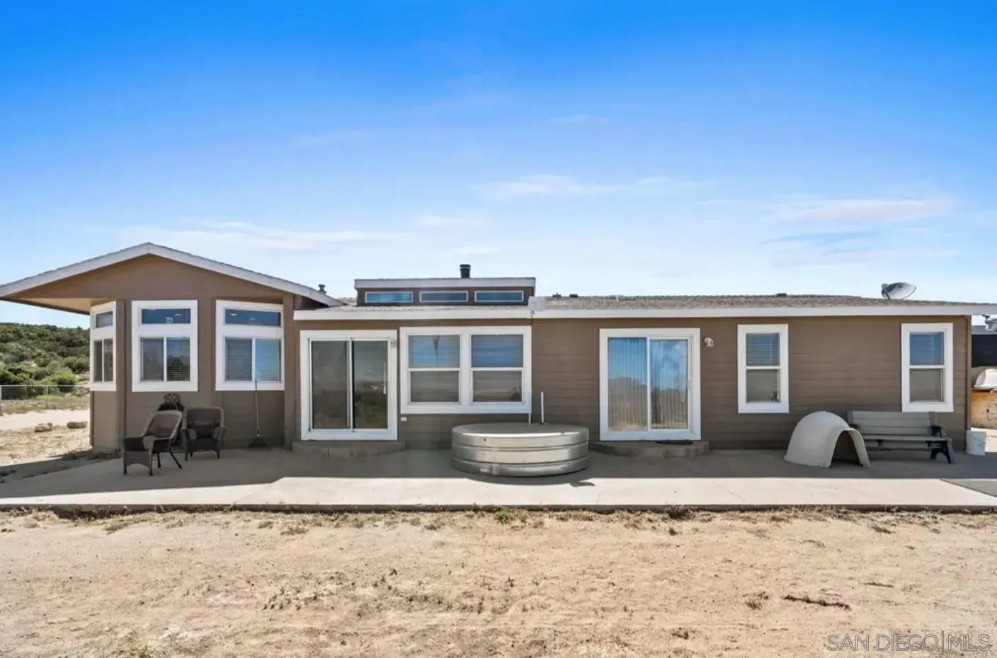 39201 Opalocka Road Boulevard, CA 91905 - Photo 17 of 21 a front view of a house with a yard