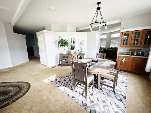 a view of a dining room with furniture