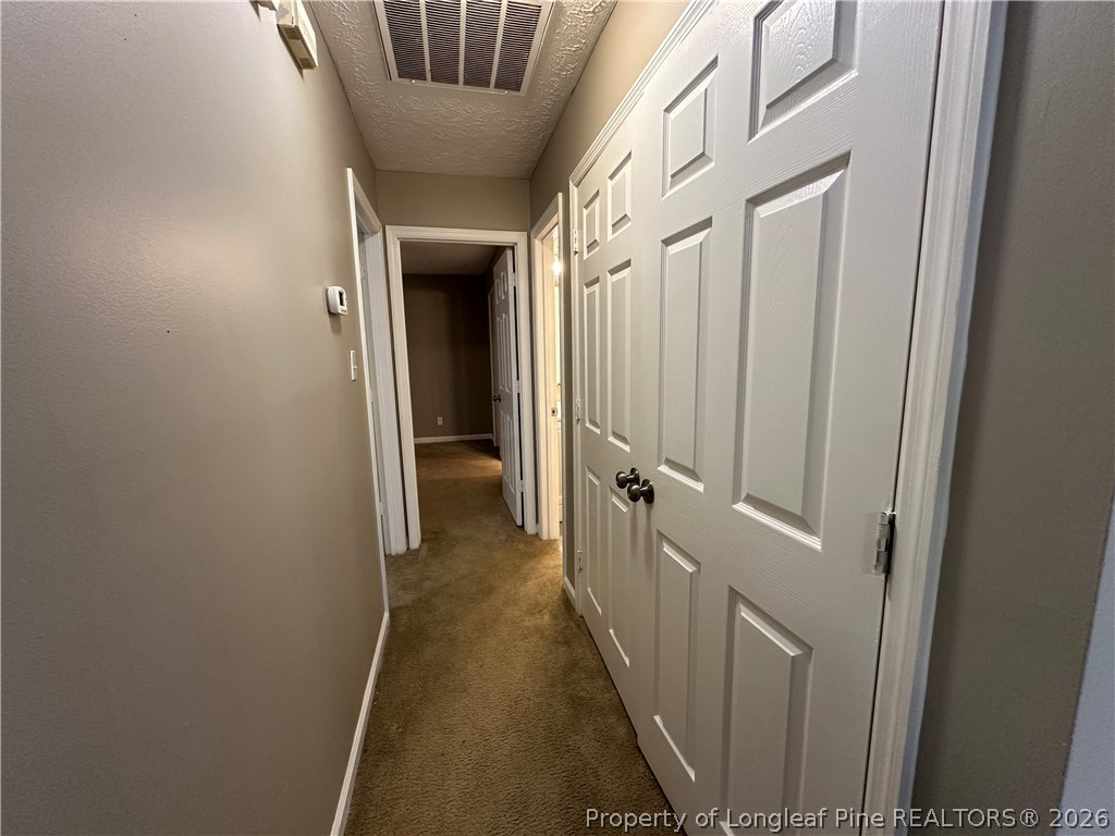 2678 Rivercliff Road Fayetteville, NC 28301 - Photo 9 of 19 a view of a hallway