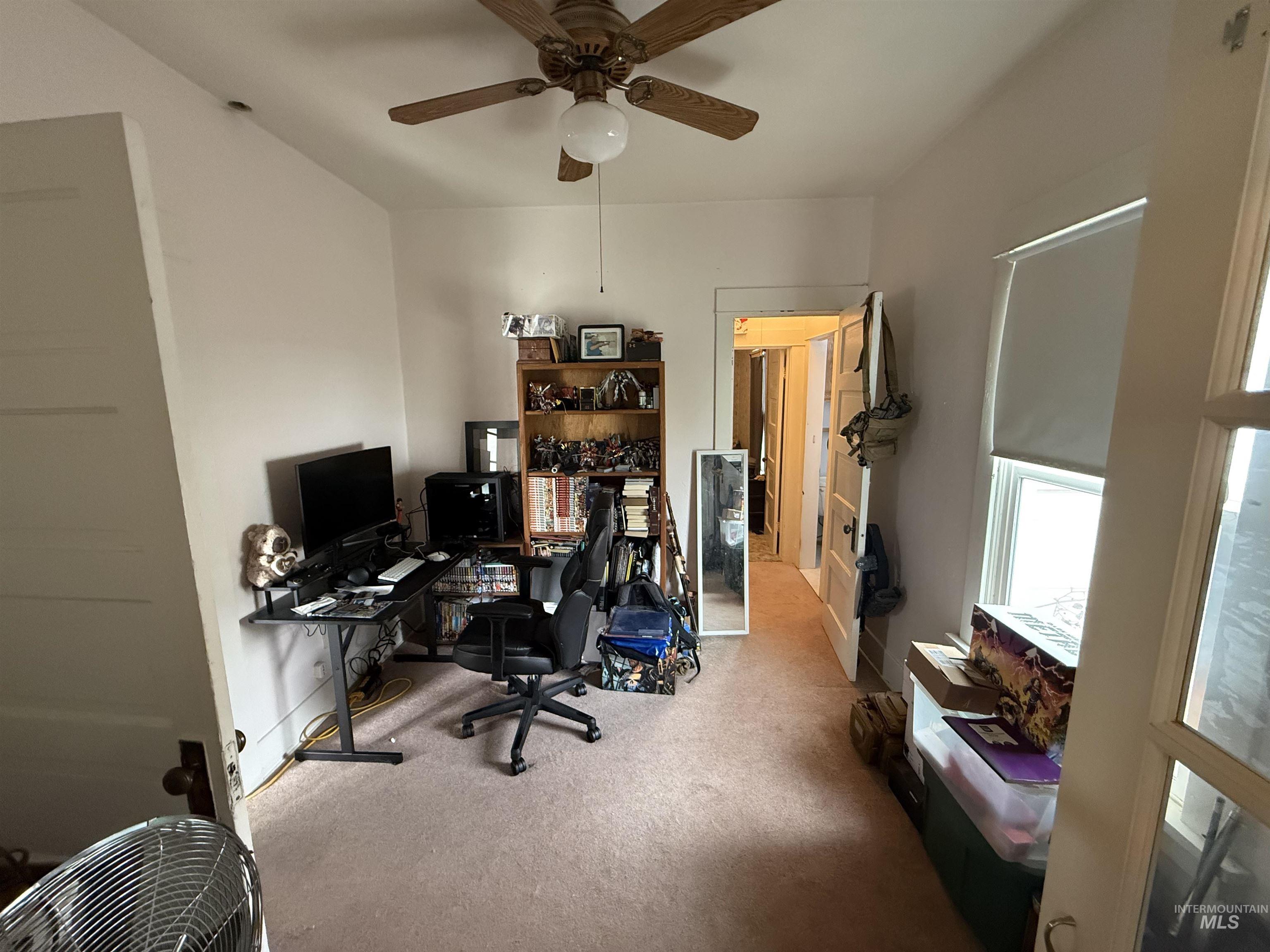 918 5th Street Rupert, ID 83350 - Photo 11 of 14 Office space featuring light colored carpet and ceiling fan