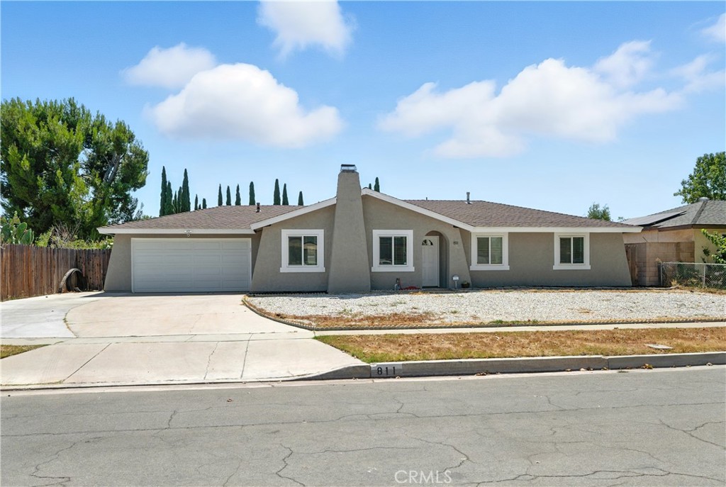 811 West James Street Rialto, CA 92376 - Photo 1 of 43 a front view of a house with a entertaining space