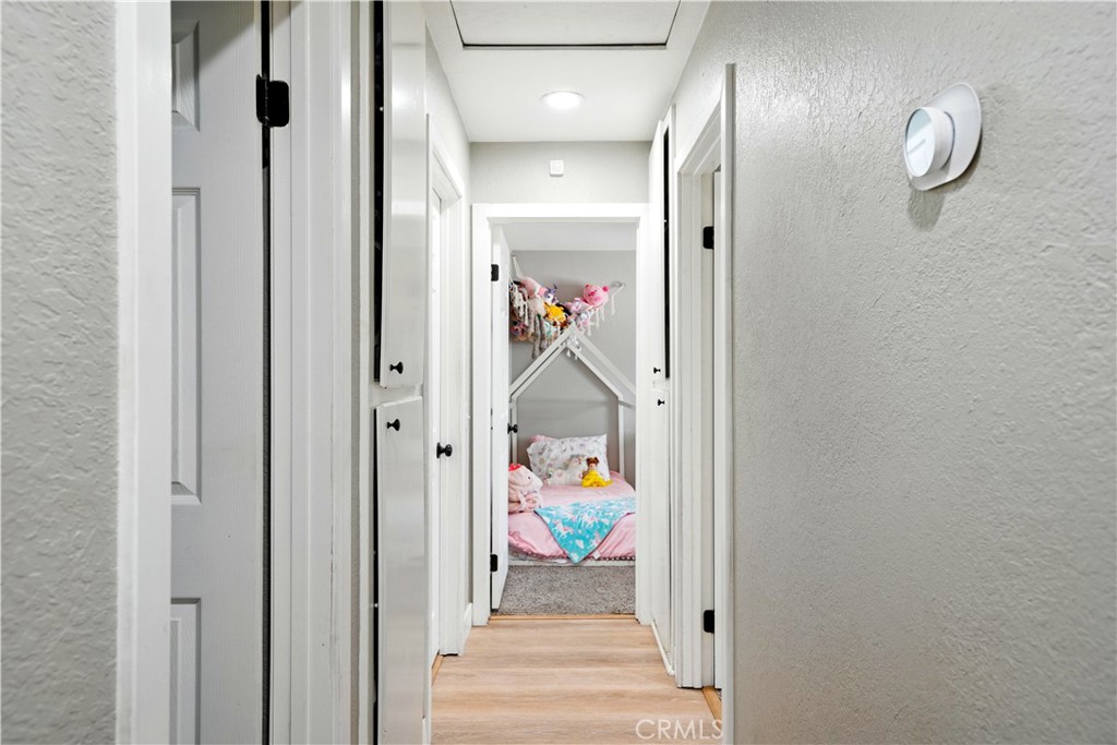 811 West James Street Rialto, CA 92376 - Photo 25 of 43 a view of a hallway with dining area