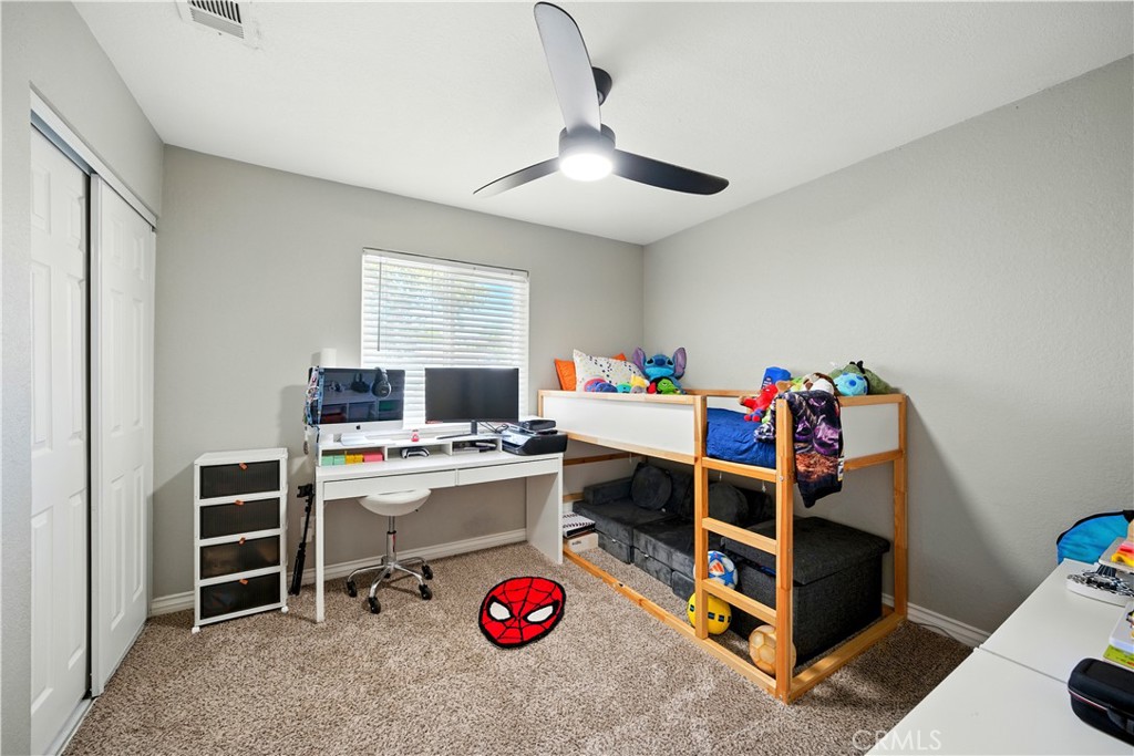 811 West James Street Rialto, CA 92376 - Photo 27 of 43 a view of a workspace with furniture