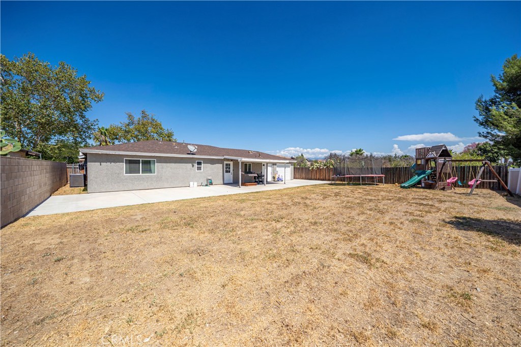 811 West James Street Rialto, CA 92376 - Photo 34 of 43 a front view of a house with a yard