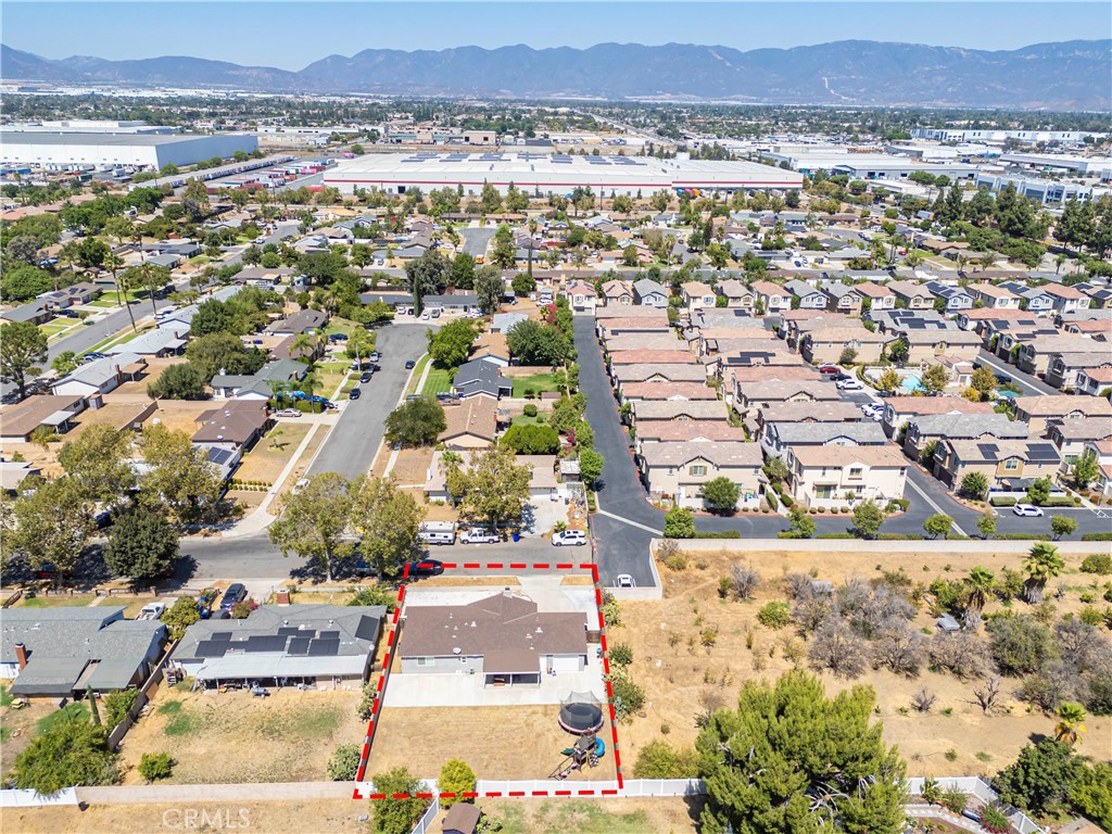 811 West James Street Rialto, CA 92376 - Photo 40 of 43 an aerial view of residential houses with outdoor space