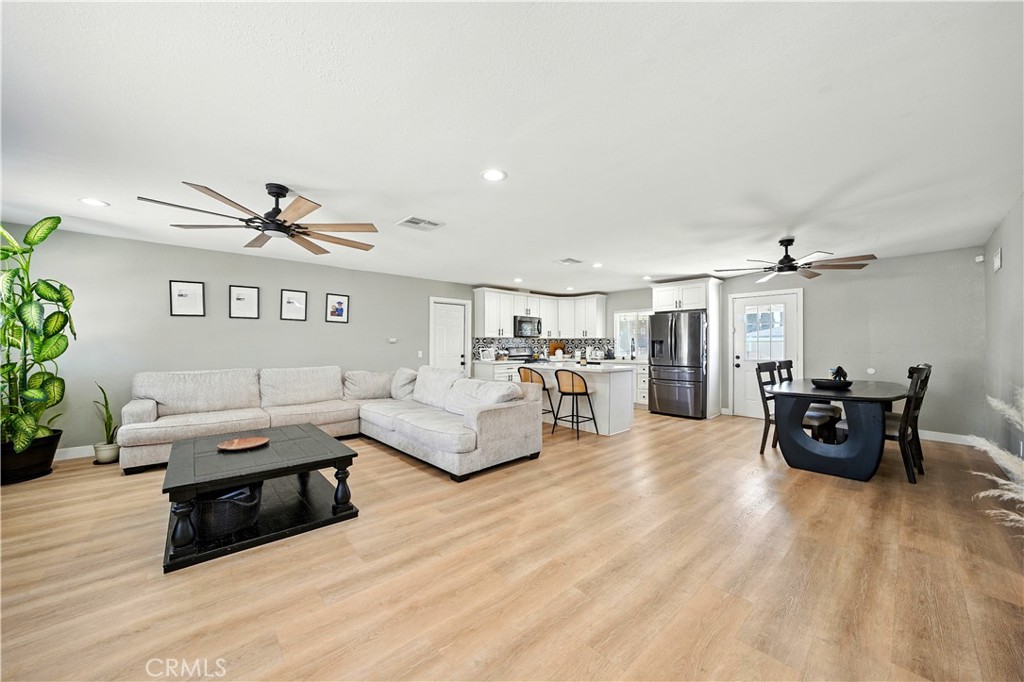 811 West James Street Rialto, CA 92376 - Photo 10 of 43 a living room with furniture and wooden floor