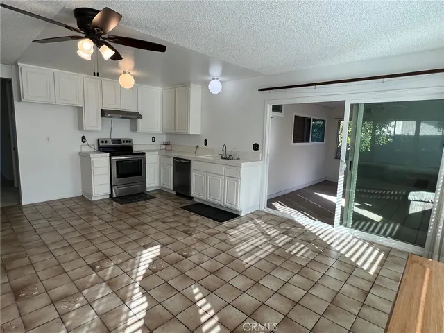 a view of a room with wooden walls