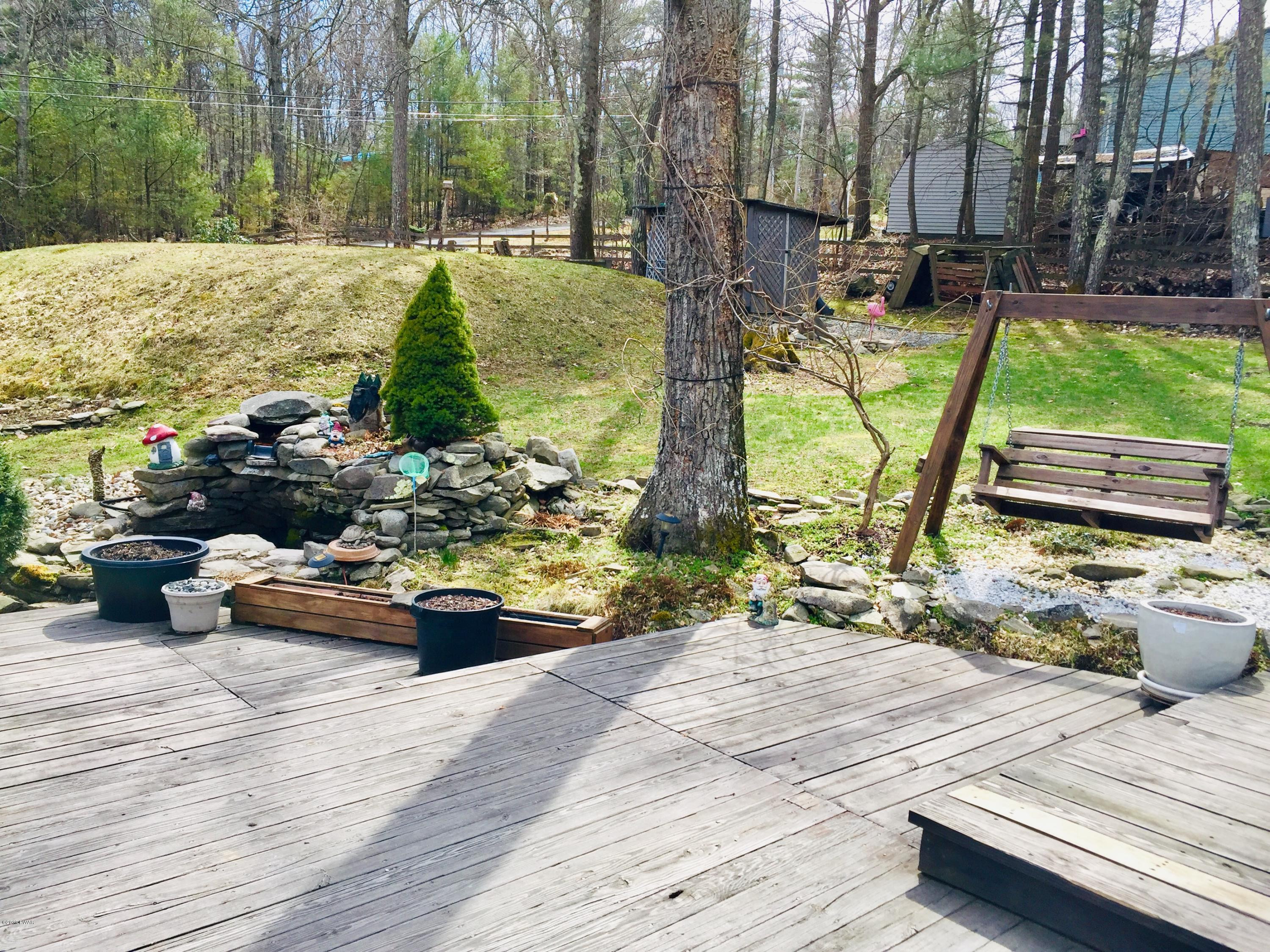 121 Pedersen Ridge Road Milford, PA 18337 - Photo 28 of 35 Swing and Waterfountain