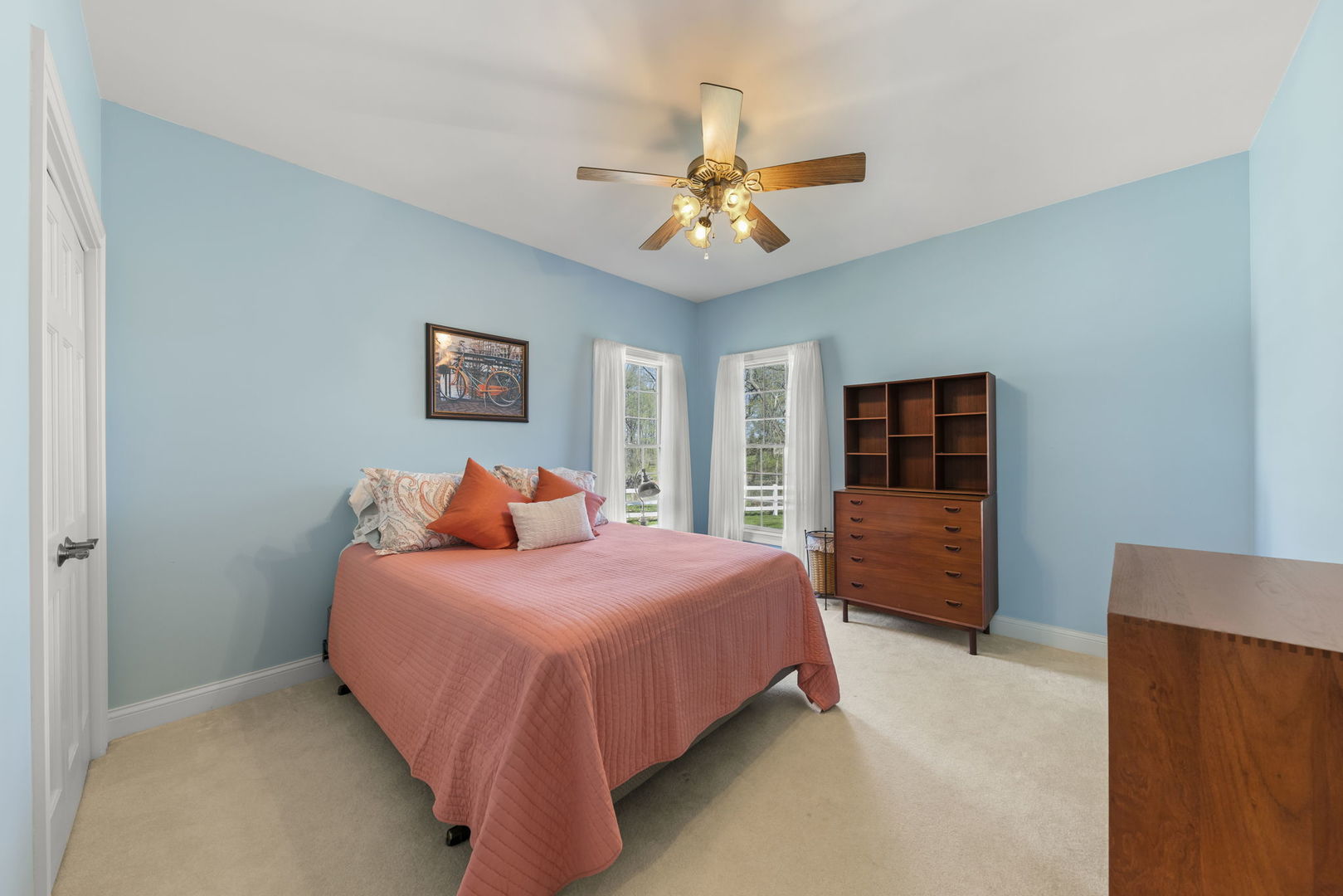 15646 Griswold Springs Road Plano, IL 60545 - Photo 13 of 46 a bedroom with a bed and a large window