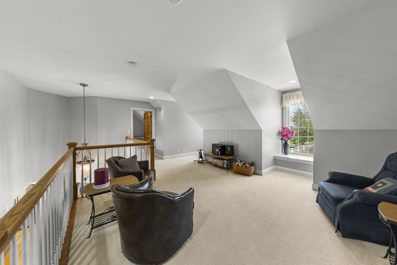 15646 Griswold Springs Road Plano, IL 60545 - Photo 17 of 46 a living room with furniture and a wooden floor