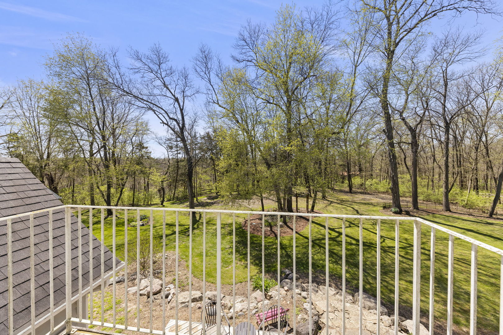 15646 Griswold Springs Road Plano, IL 60545 - Photo 27 of 46 a view of a balcony with floor to ceiling window and tree
