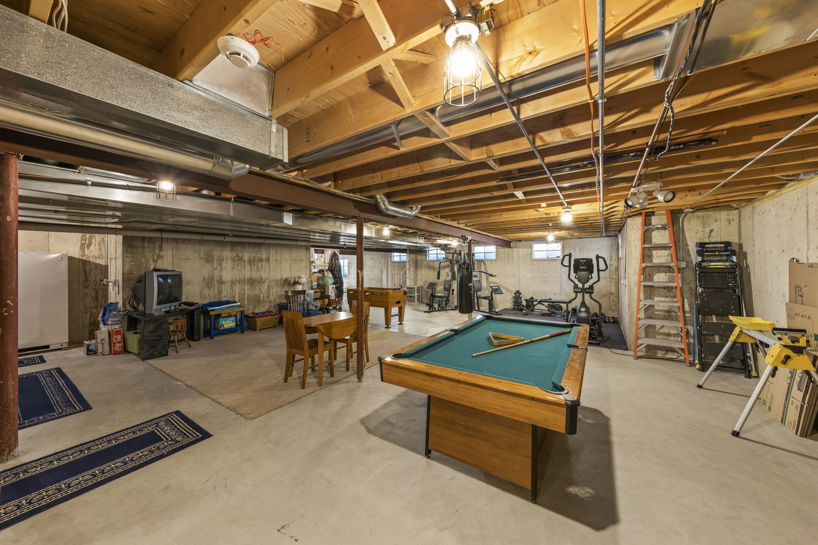 15646 Griswold Springs Road Plano, IL 60545 - Photo 28 of 46 a view of a room with gym equipment