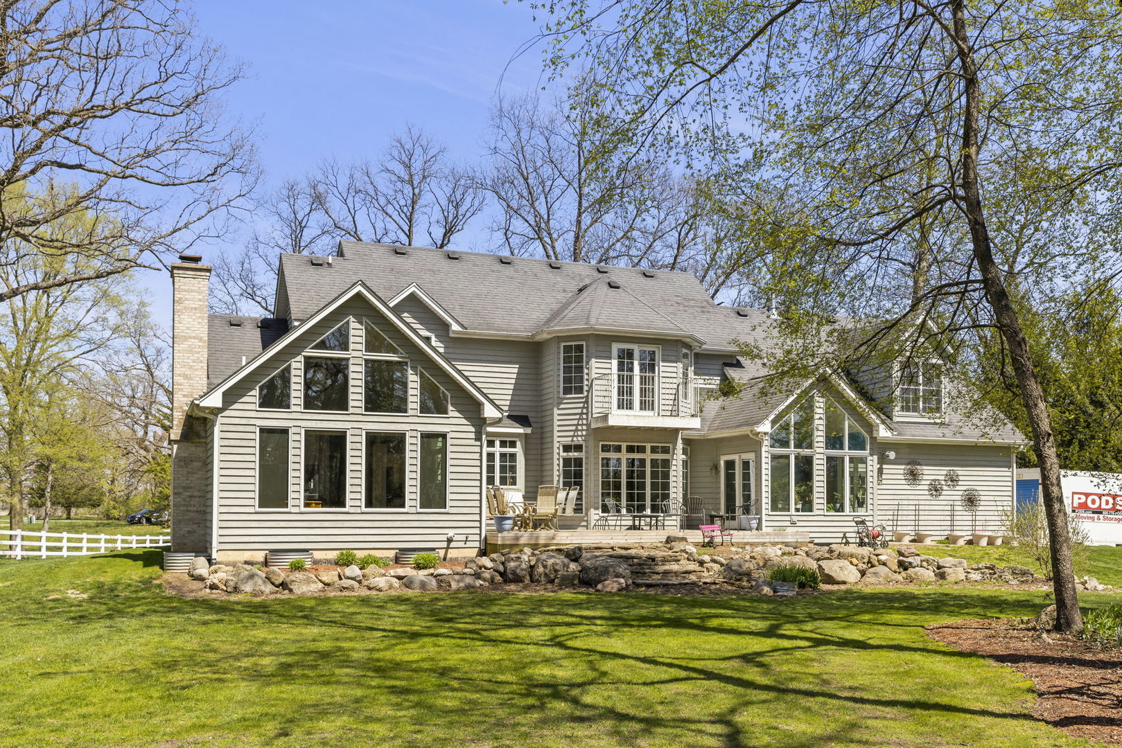 15646 Griswold Springs Road Plano, IL 60545 - Photo 35 of 46 a front view of a house with a garden