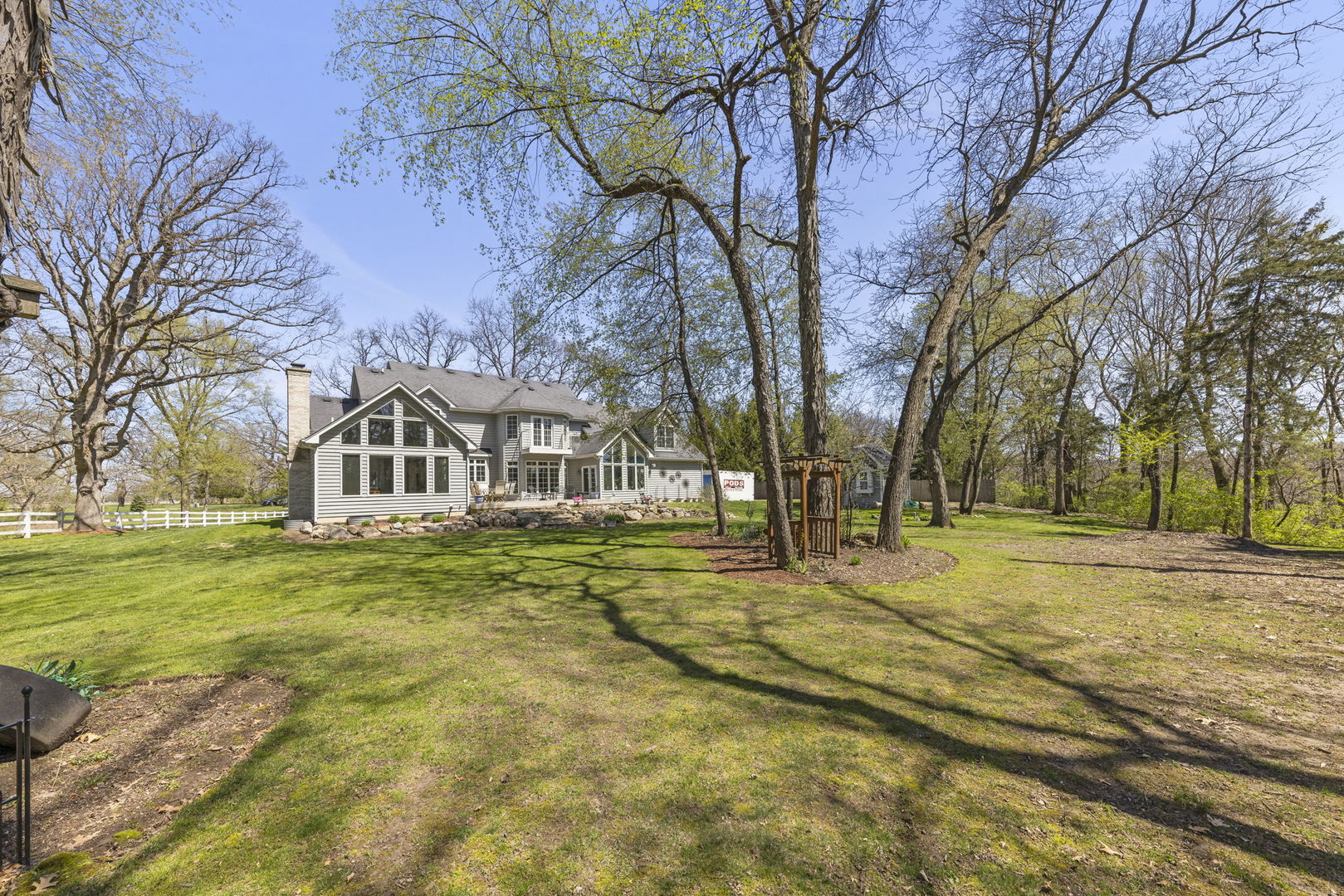 15646 Griswold Springs Road Plano, IL 60545 - Photo 37 of 46 a view of a trees in front of a house