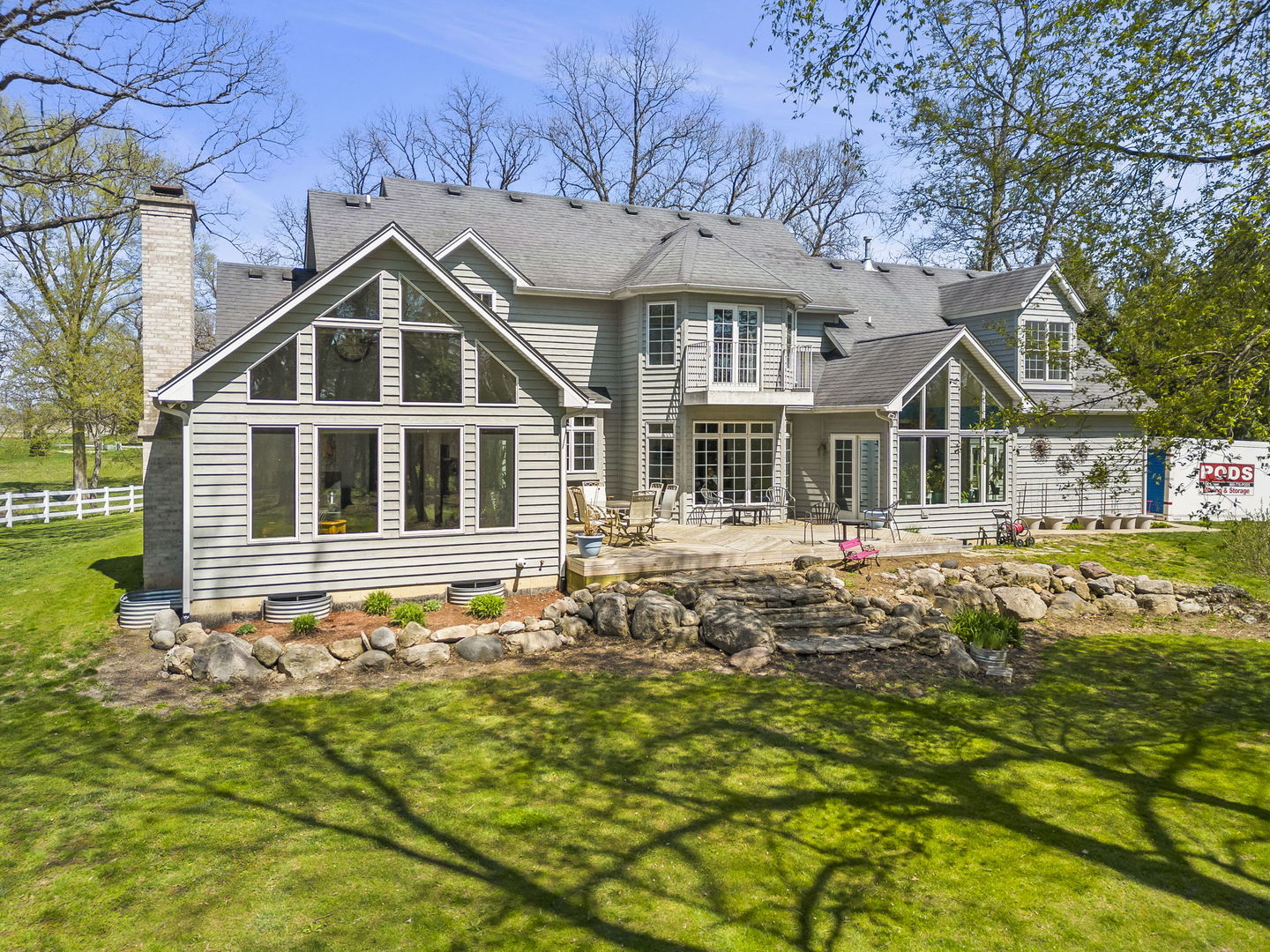 15646 Griswold Springs Road Plano, IL 60545 - Photo 40 of 46 a front view of a house with a garden