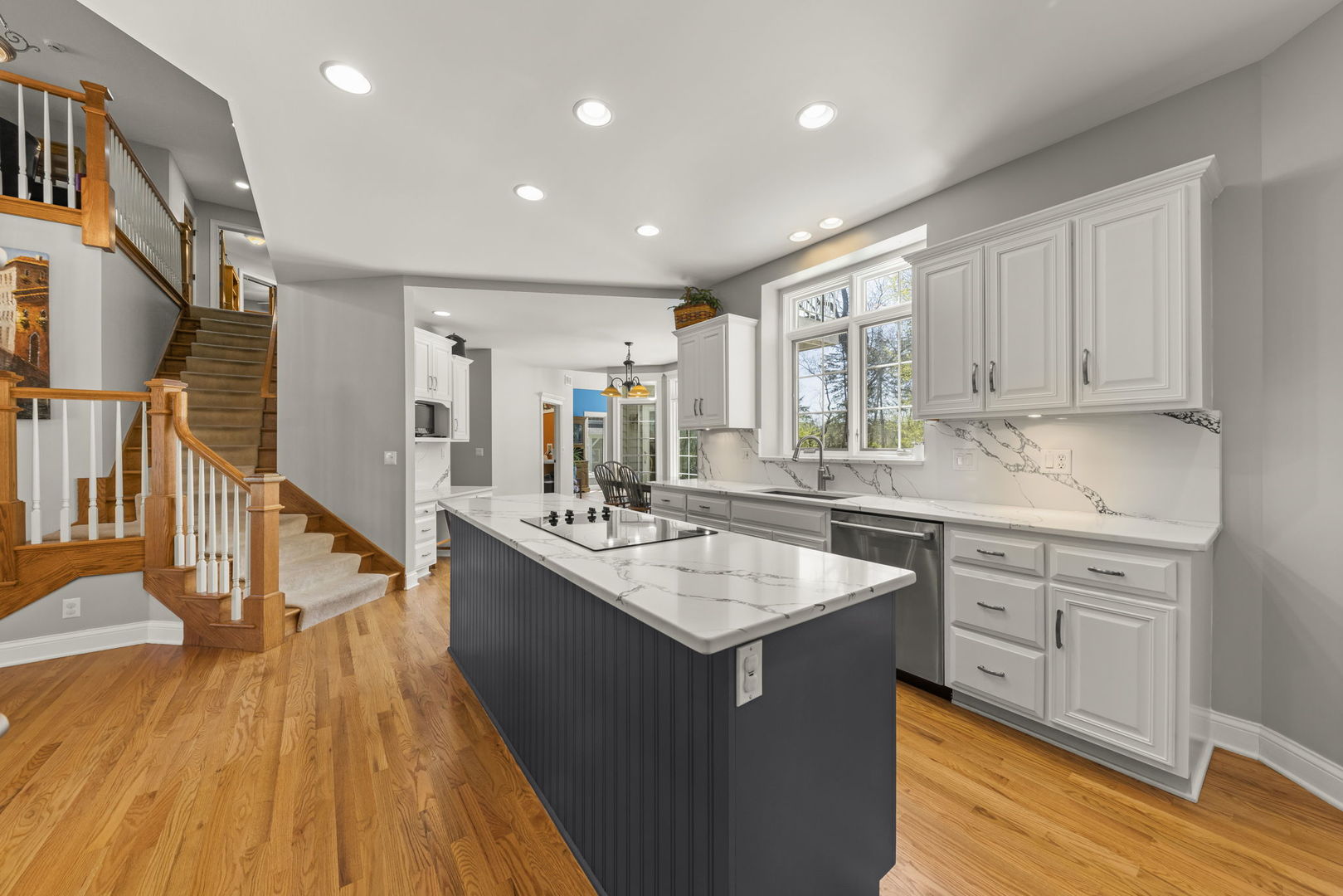 15646 Griswold Springs Road Plano, IL 60545 - Photo 7 of 46 a kitchen with sink a counter top space and cabinets
