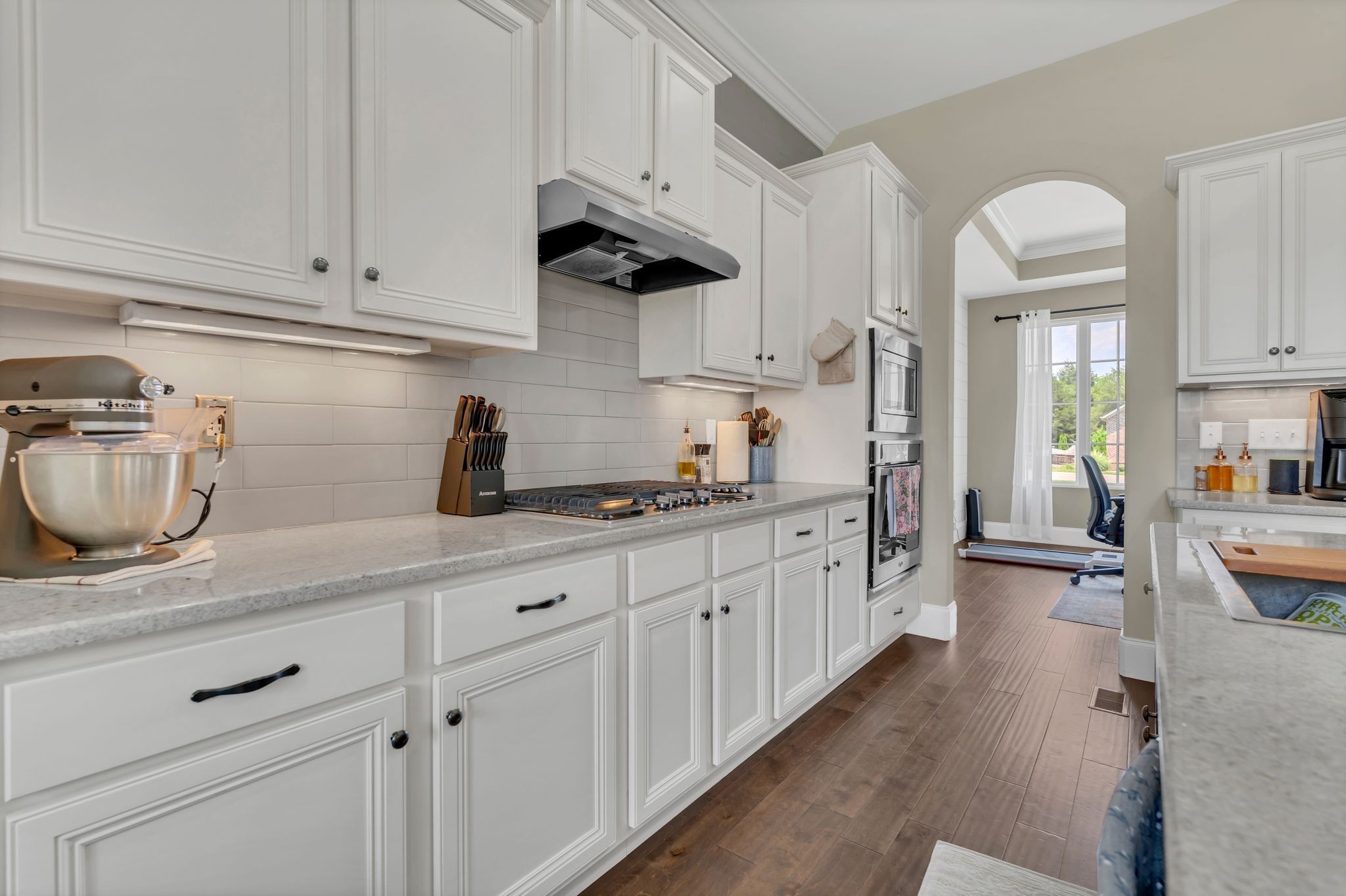 7121 Springwater Street Smyrna, TN 37167 - Photo 13 of 33 a kitchen with sink a stove and cabinets