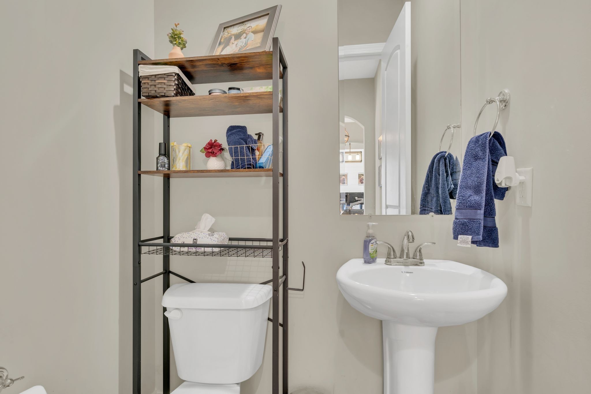 7121 Springwater Street Smyrna, TN 37167 - Photo 16 of 33 a bathroom with a sink and a mirror