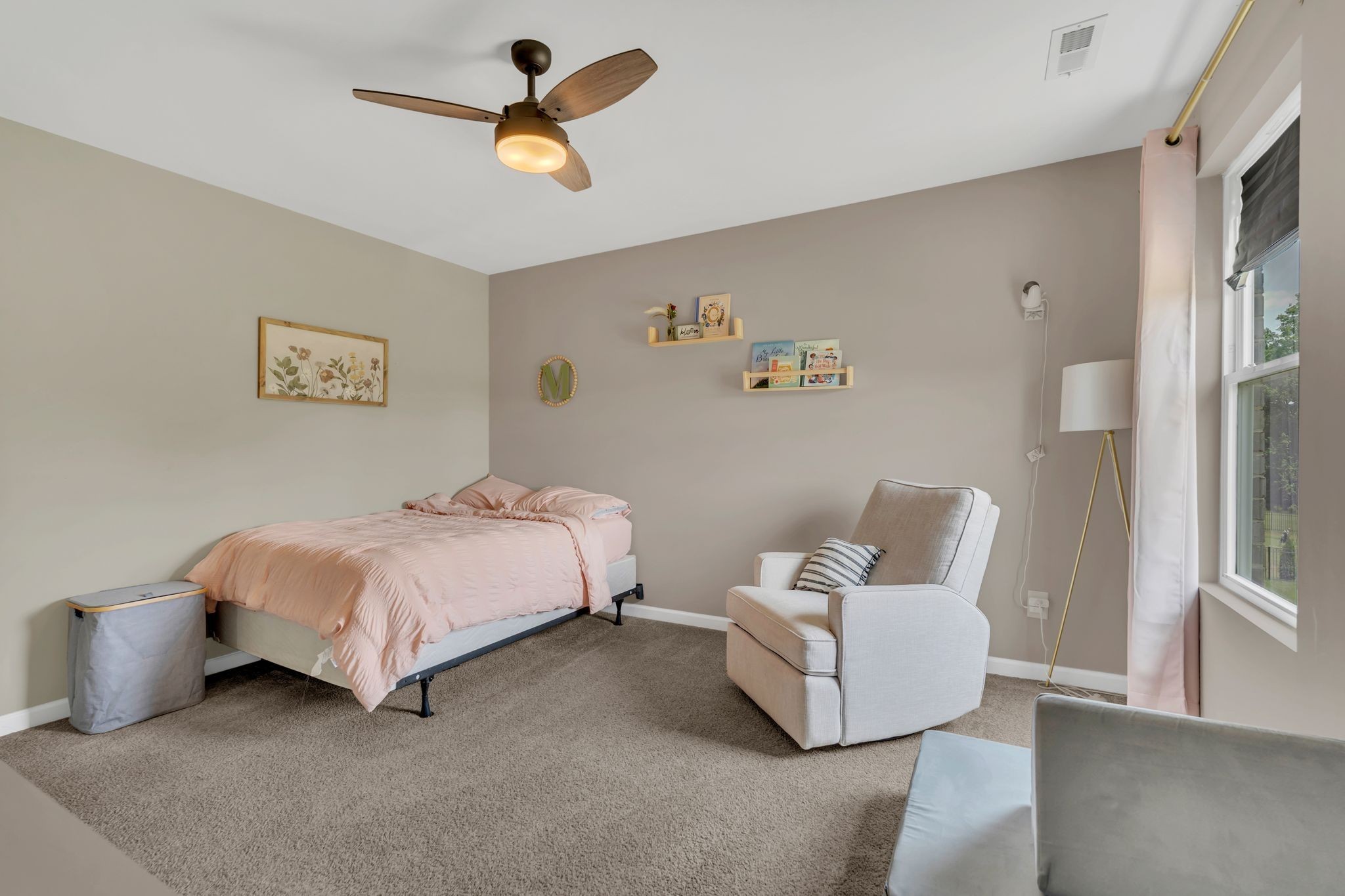 7121 Springwater Street Smyrna, TN 37167 - Photo 22 of 33 a spacious bedroom with a bed and a ceiling fan