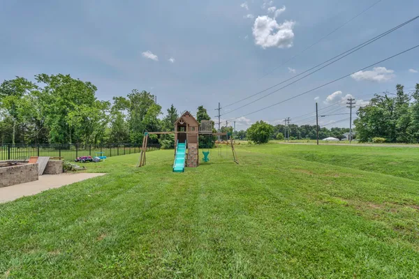 a view of a park with swings