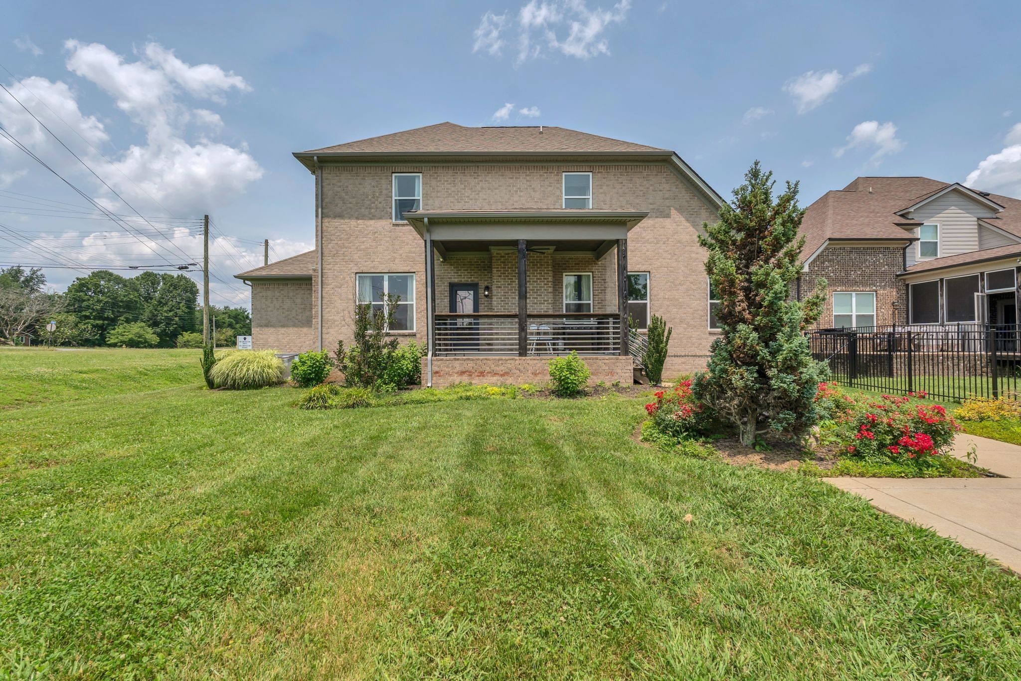 7121 Springwater Street Smyrna, TN 37167 - Photo 29 of 33 a view of a house with a big yard plants and large trees