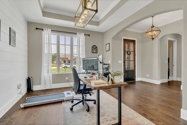 a workspace with wooden floor
