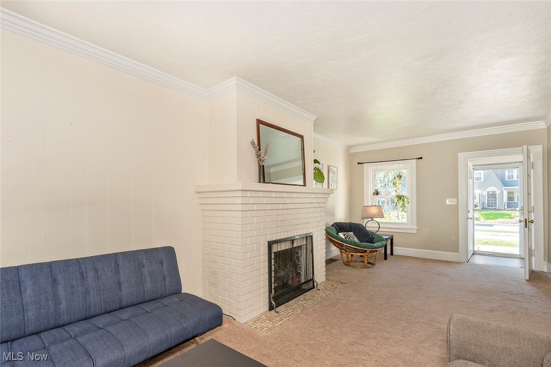3573 Silsby Road Cleveland, OH 44118 - Photo 6 of 29 Bright, open living space with gas fireplace to anchor the room.