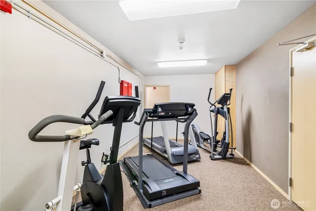 a view of a room with gym equipment