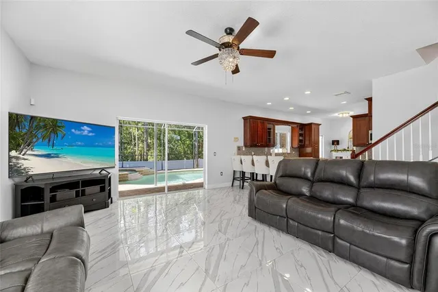 a living room with furniture and a window