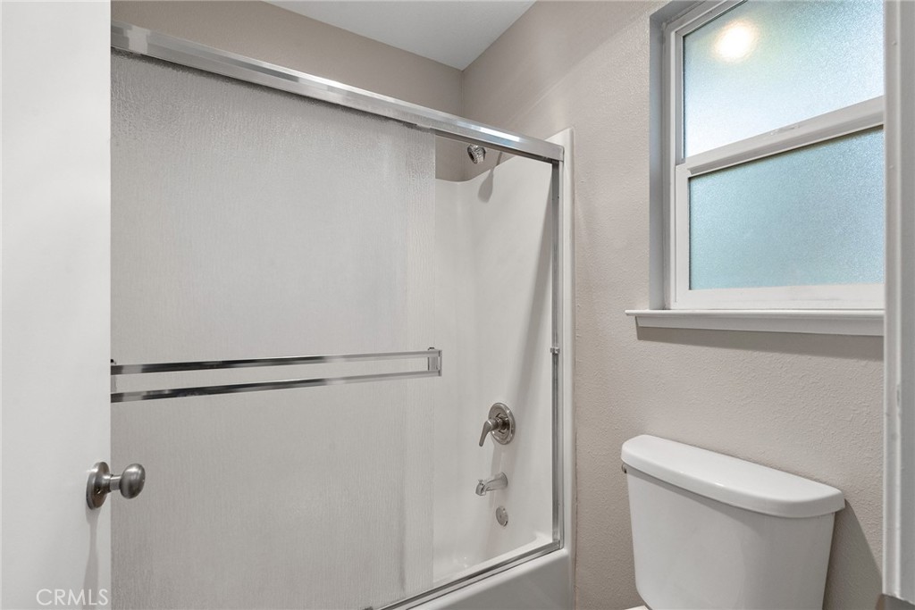 2159 Elm Street, Unit 2 Chico, CA 95928 - Photo 17 of 28 a bathroom with a shower and a toilet